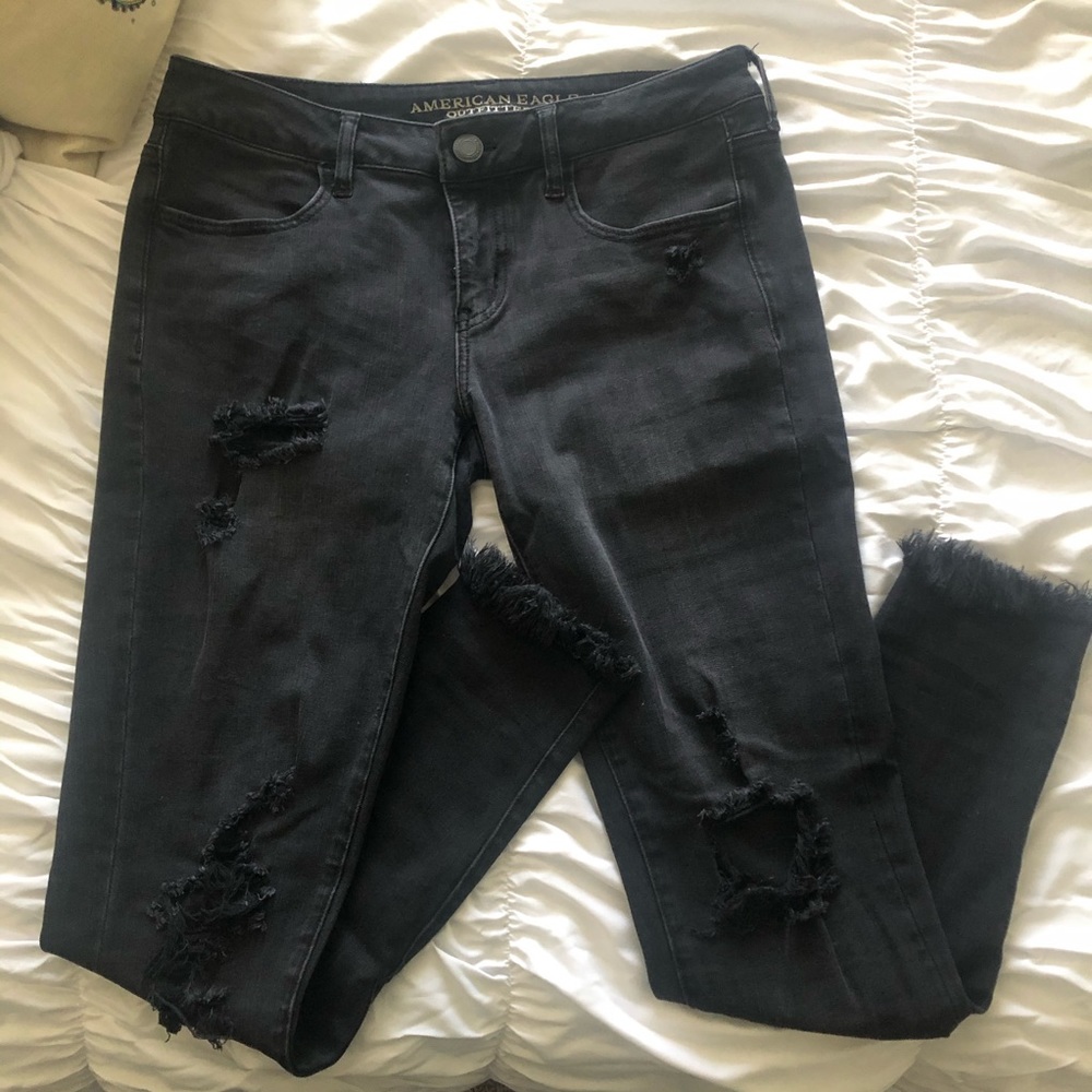 Black distressed super low rise jegging